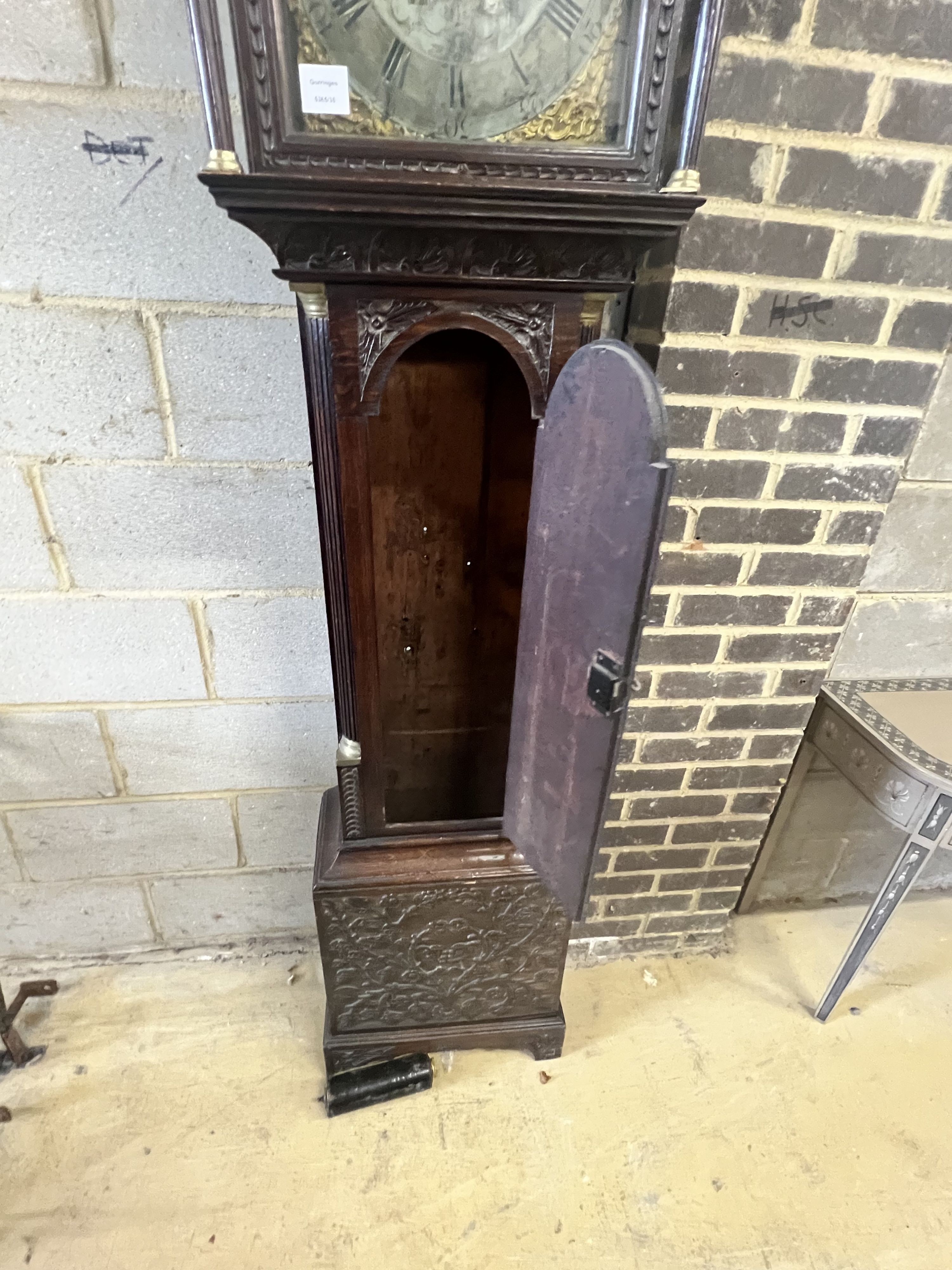 Barrett of Stowmarket. A George III carved oak eight day longcase clock, height 220cm